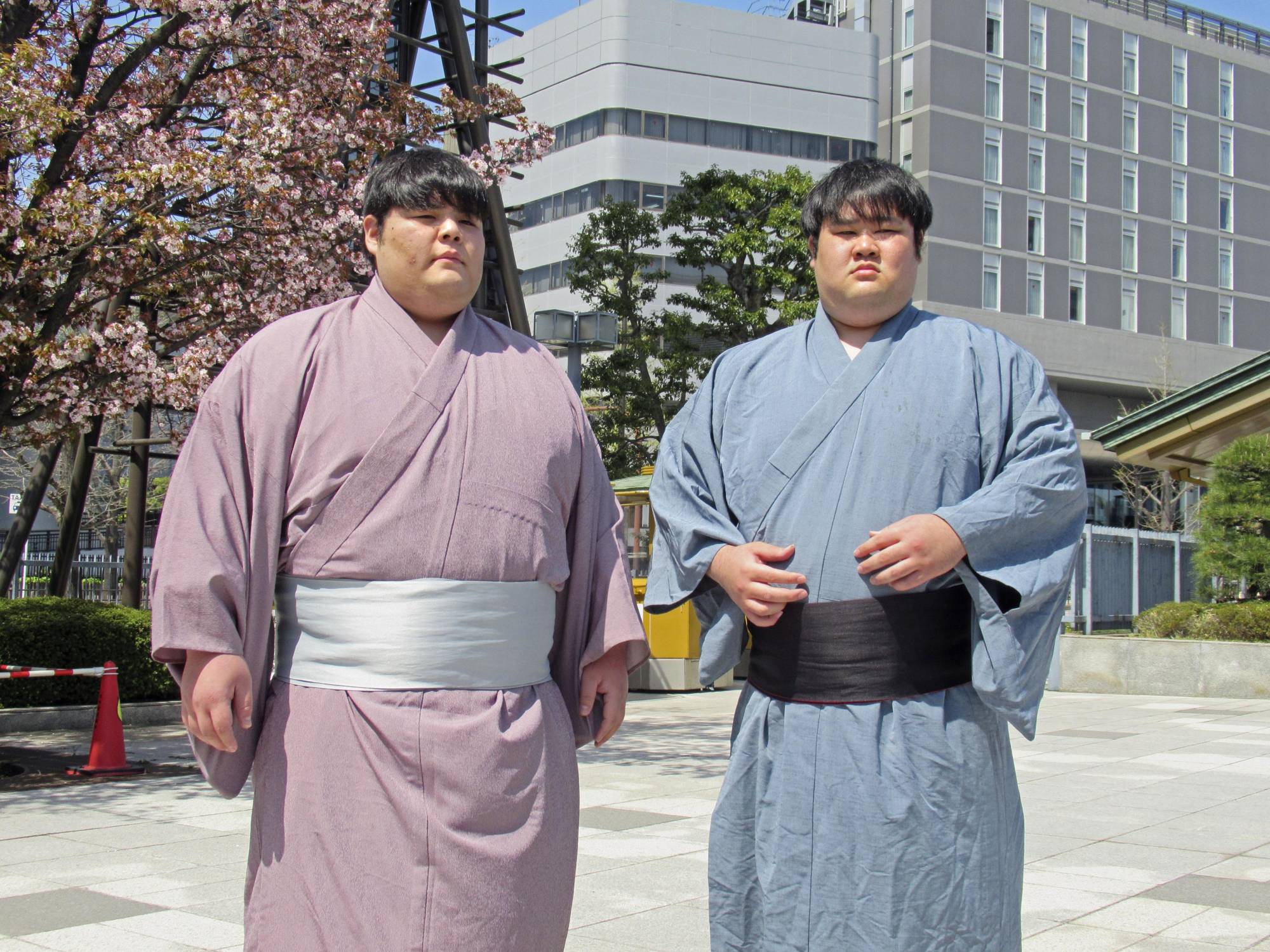 Nihon University graduates Ryusei Shiroma (left) and Mantaro Haruyama were among 33 recruits to participate in sumo's seasonal entrance examinations on Tuesday. | REUTERS