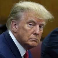 Former U.S. president Donald Trump appears in court at the Manhattan Criminal Court in New York on Tuesday | POOL / VIA AFP-JIJI
