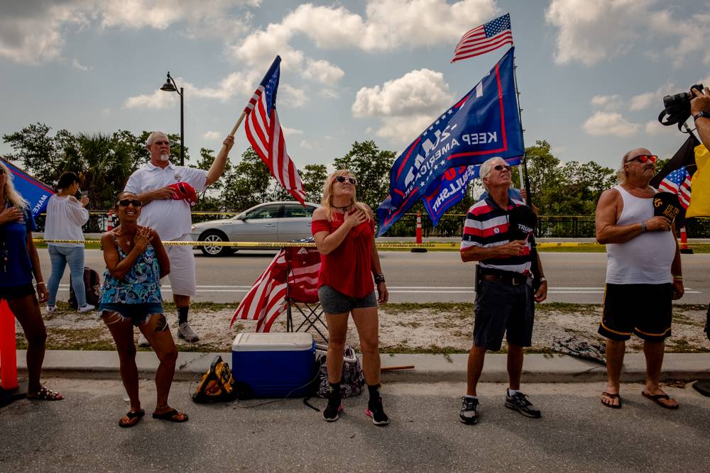 Supporters of former U.S. President Donald Trump outside the Mar-a-Lago Club owned by Trump, in Palm Beach, Florida, on Sunday | Hilary Swift / The New York Times
