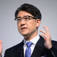 Sato during a news conference in Tokyo on Friday. The CEO unveiled the beginnings of a long-awaited plan to electrify the automaker’s vehicle lineup during his first news conference, but stopped short of revealing how the company will match its EV rivals. | BLOOMBERG
