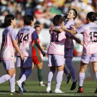 Nadeshiko Japan players celebrate Mina Tanaka\'s (center) goal against Portugal in Guimaraes, Portugal, on Friday. | KYODO