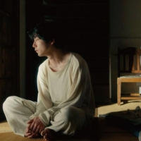 A haunted young man (Kentaro Sakaguchi) confronts secrets from his past in “Side by Side.” | © 2023 ‘SIDE BY SIDE’ FILM PARTNERS
