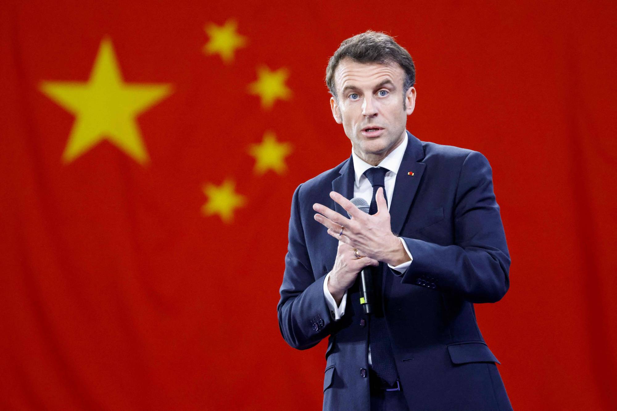 French President Emmanuel Macron speaks to students at Sun Yat-sen University in Guangzhou, China, on Friday. | AFP-JIJI