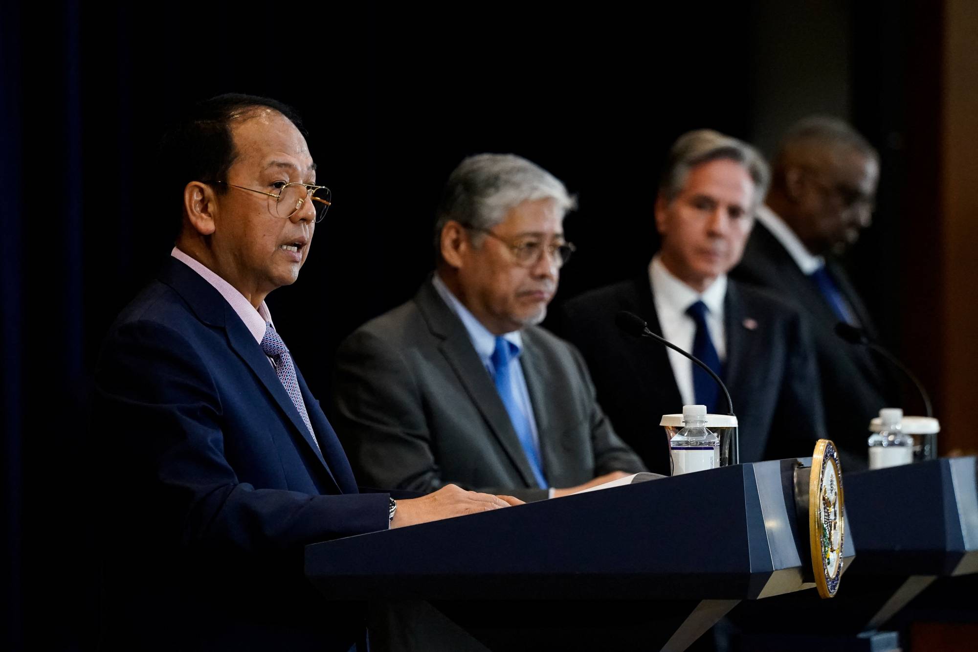 Philippine defense chief Carlito Galvez (from left) speaks during a joint news conference with Philippine Secretary of Foreign Affairs Enrique Manalo, U.S. Secretary of State Antony Blinken and U.S. Defense Secretary Lloyd Austin at the State Department in Washington on Tuesday. | REUTERS