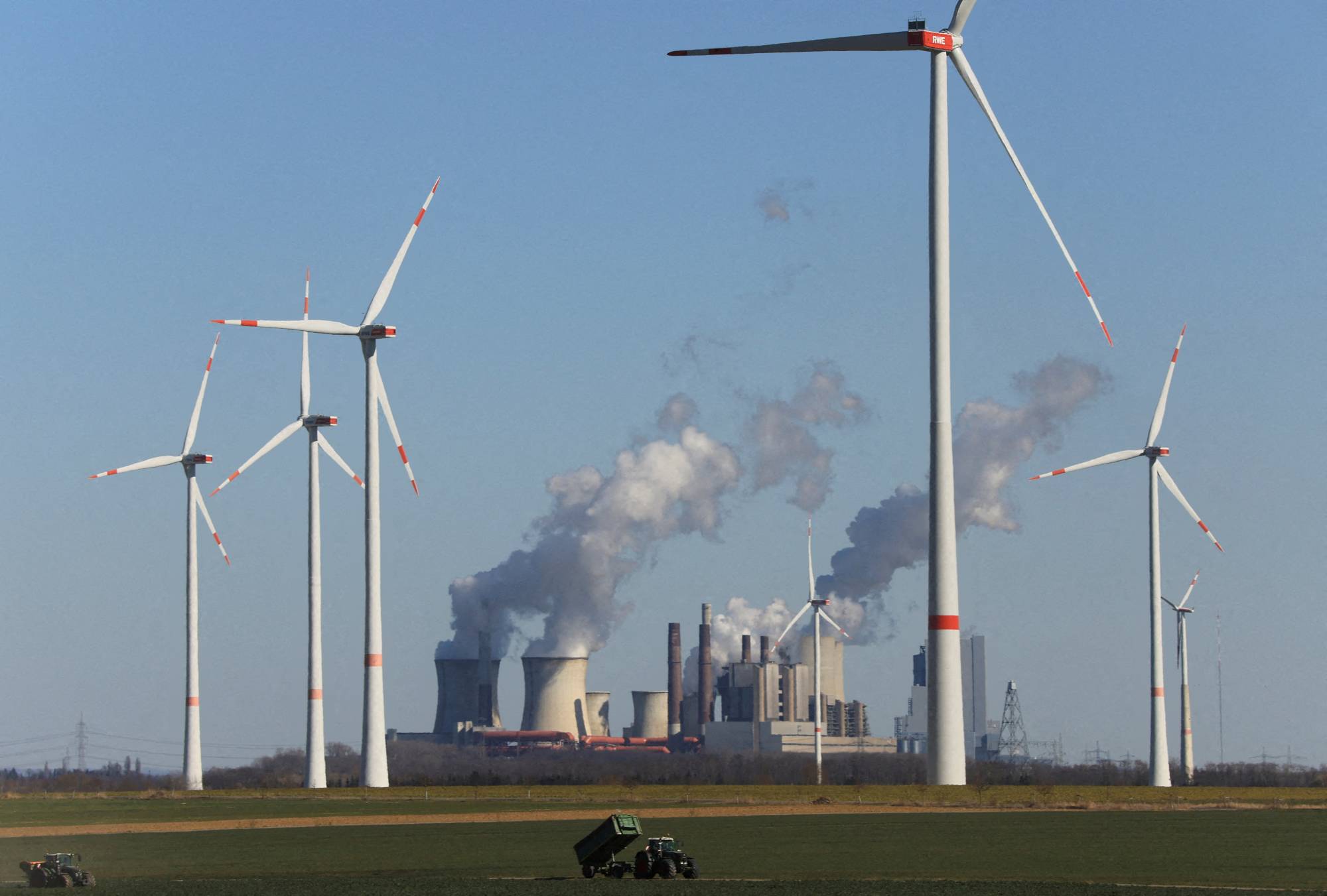 This year, wind and solar are set to expand enough that total electricity production from fossil fuels will decline slightly and continue downward through at least 2026, a forecast has found. | REUTERS 
