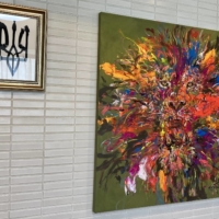A depiction of Ukraine\'s coat of arms (left) inside the nation\'s embassy in Tokyo. Korsunsky asked his calligraphy instructor to create the piece.  | DANIEL TRAYLOR