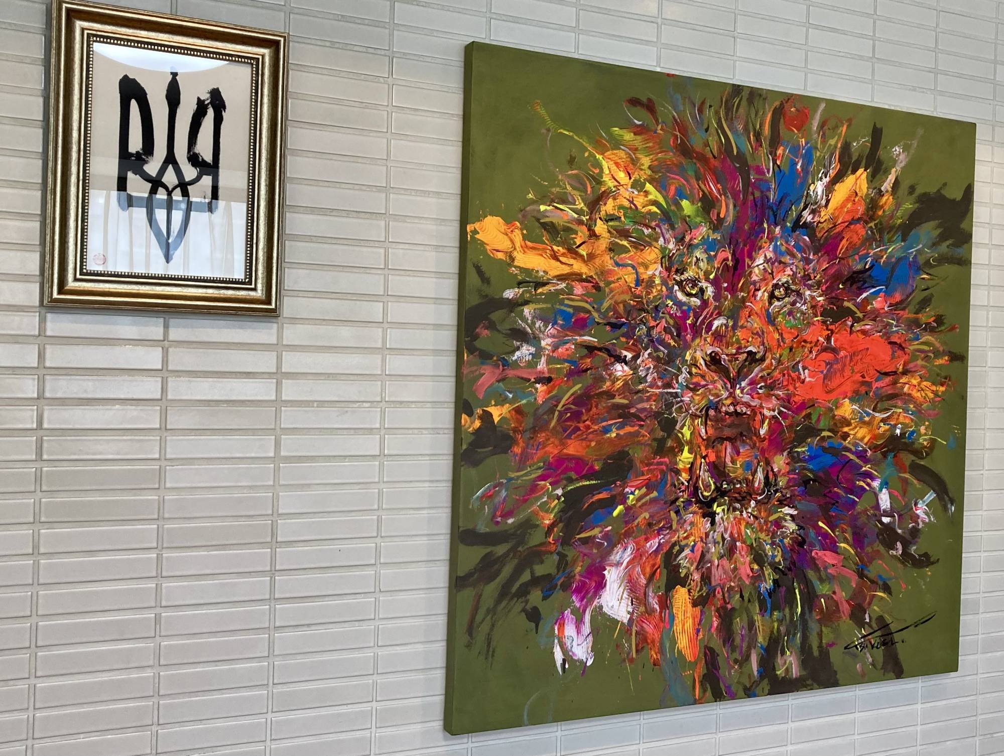 A depiction of Ukraine's coat of arms (left) inside the nation's embassy in Tokyo. Korsunsky asked his calligraphy instructor to create the piece. | Daniel Traylor