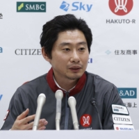 Takeshi Hakamada, founder and chief executive officer of Ispace, speaks during a news conference at the Tokyo Stock Exchange on Wednesday. | BLOOMBERG