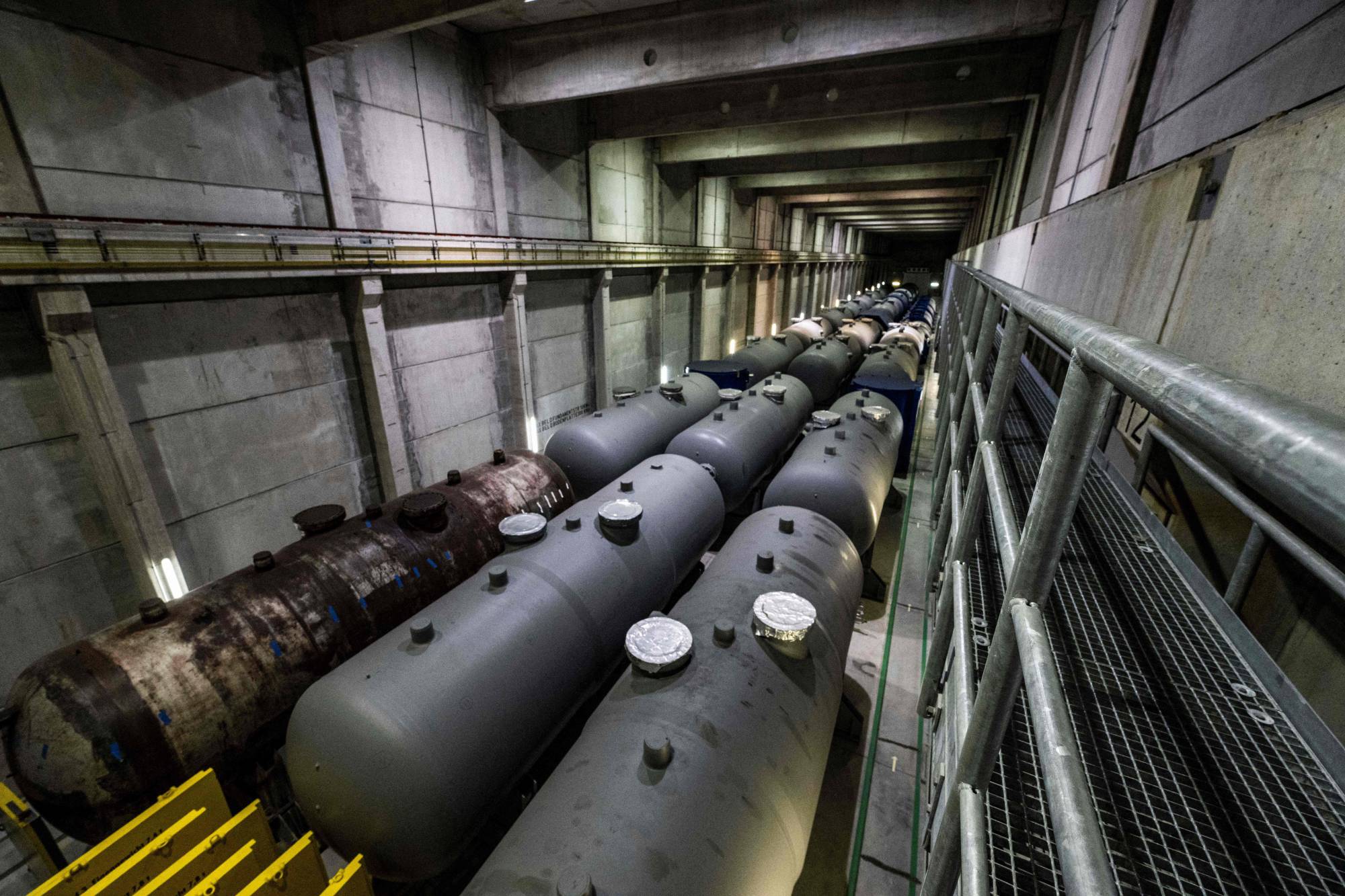 Reactor pressure vessels stored in a giant hangar before being dismantled at a nuclear plant in Lubmin, Germany, in March | AFP-JIJI