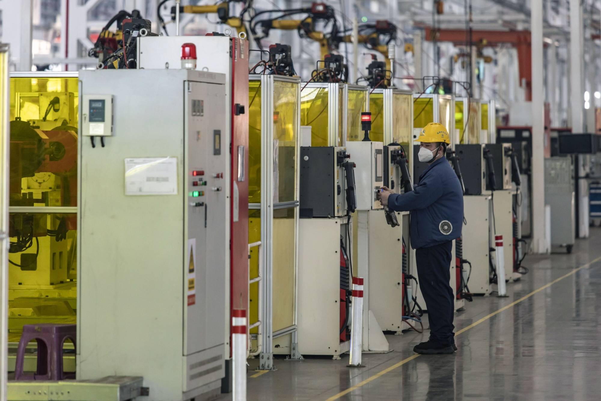 A Shanghai Sany Heavy Machinery assembly line in Shanghai | BLOOMBERG