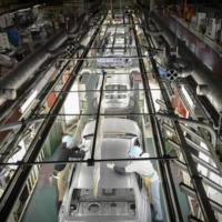 A production line at Toyota’s Tsutsumi plant in Toyota City in 2017. The world’s top-selling carmaker had to halt operations at 14 factories after parts supplier Kojima Industries was hacked in February 2022. | BLOOMBERG