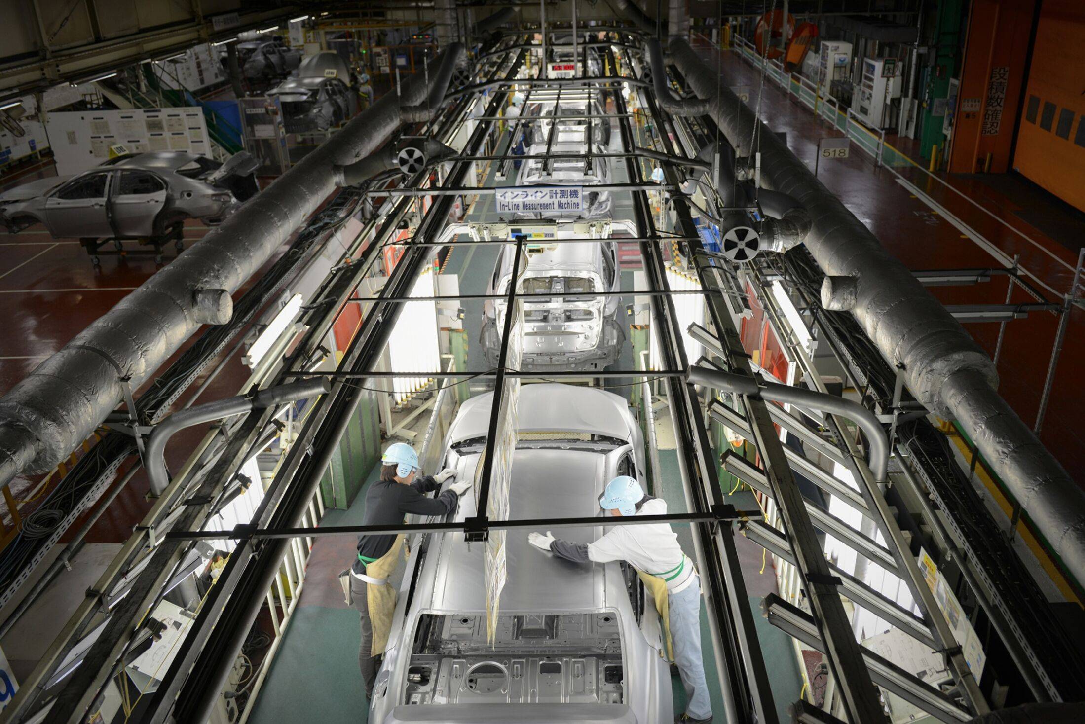 A production line at Toyota’s Tsutsumi plant in Toyota City in 2017. The world’s top-selling carmaker had to halt operations at 14 factories after parts supplier Kojima Industries was hacked in February 2022. | BLOOMBERG