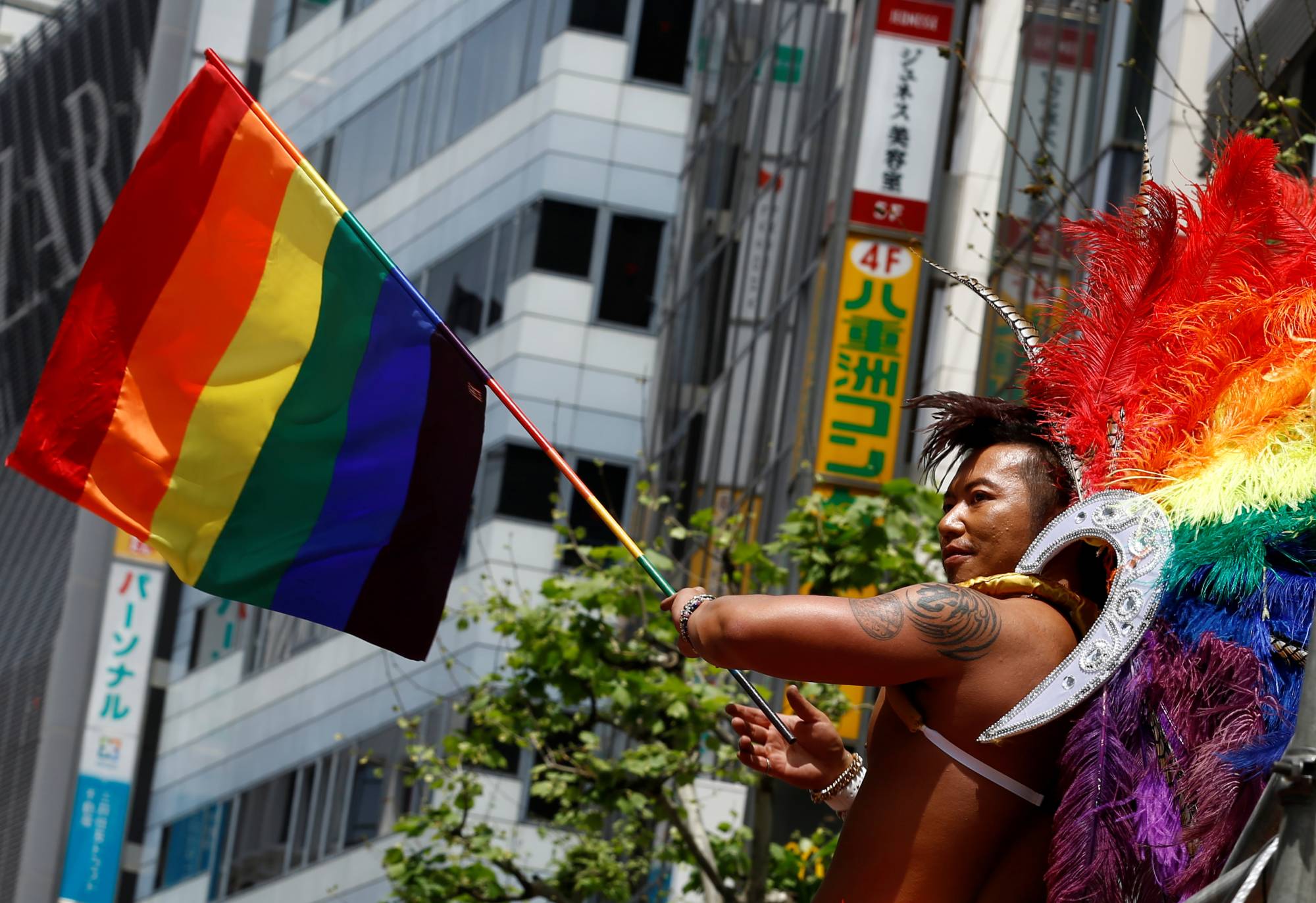 A reveler takes part in the 2016 Tokyo Rainbow Pride parade. After three years of muted celebrations, the parade hits the streets again Sunday.  | REUTERS