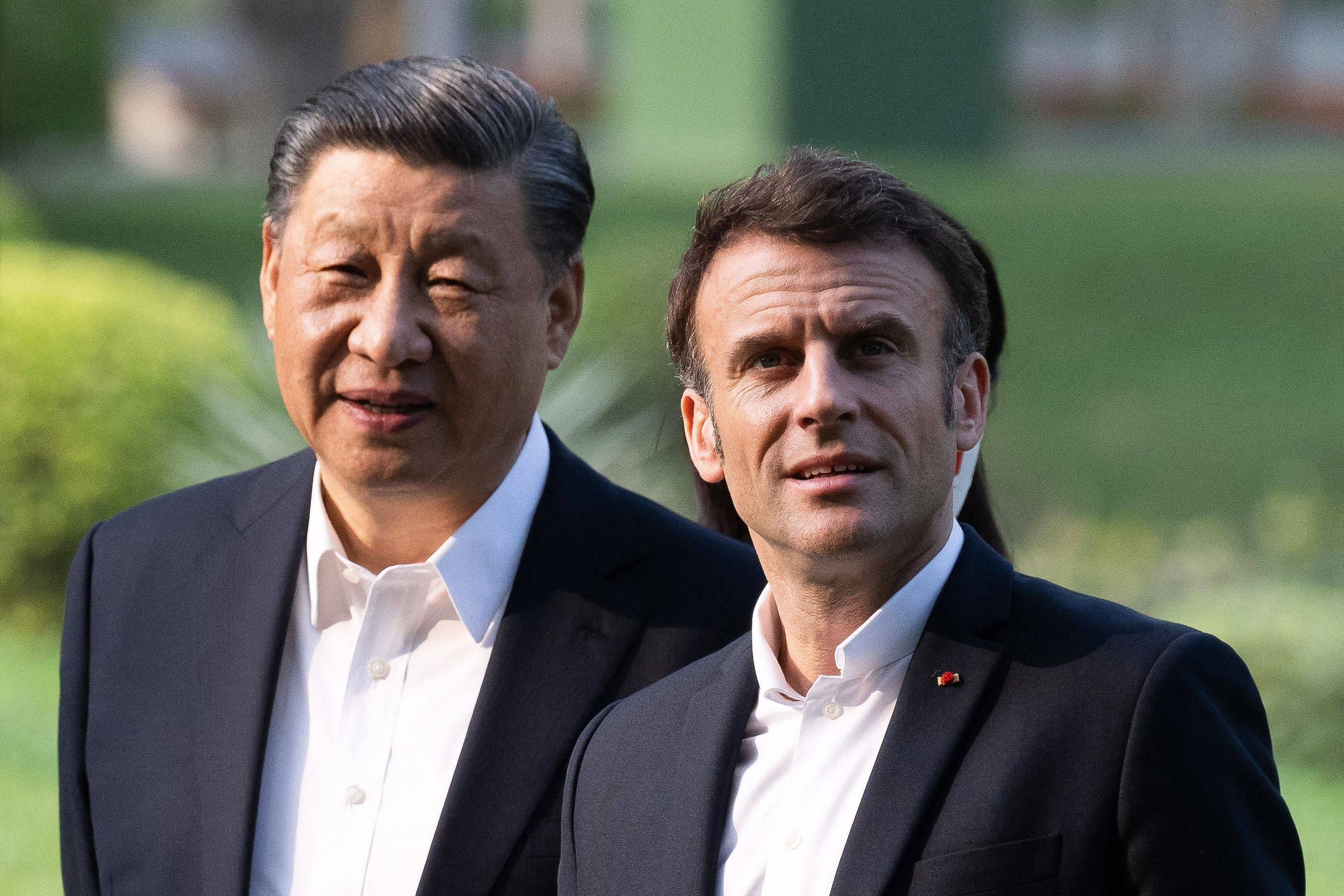 Chinese President Xi Jinping and France's President Emmanuel Macron in Guangzhou on April 7 | AFP-JIJI