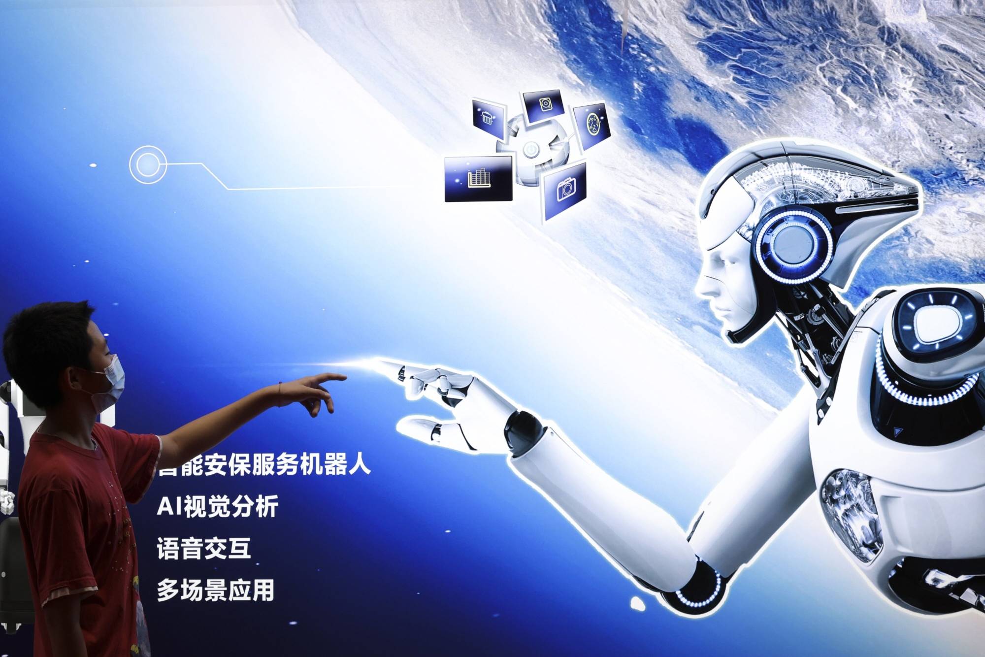 An AI robot poster at the 2022 World Robot Conference in Beijing. NATO is pushing to develop shared universal standards for new technologies, following up on an AI strategy agreed among the alliance’s members that outlines principles for responsible use.  | GETTY IMAGES