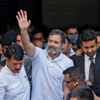Indian National Congress leader Rahul Gandhi leaves a court after he lodged an appeal against his conviction for defamation, in Surat, Gujarat State, India, on April 3. | REUTERS