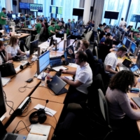 Computer specialists take part in the NATO-led Locked Shields 2023 cyber war games in Tallinn, Estonia, on April 18. Over 3,000 participants from 38 nations took part, including a team from Japan. | REUTERS