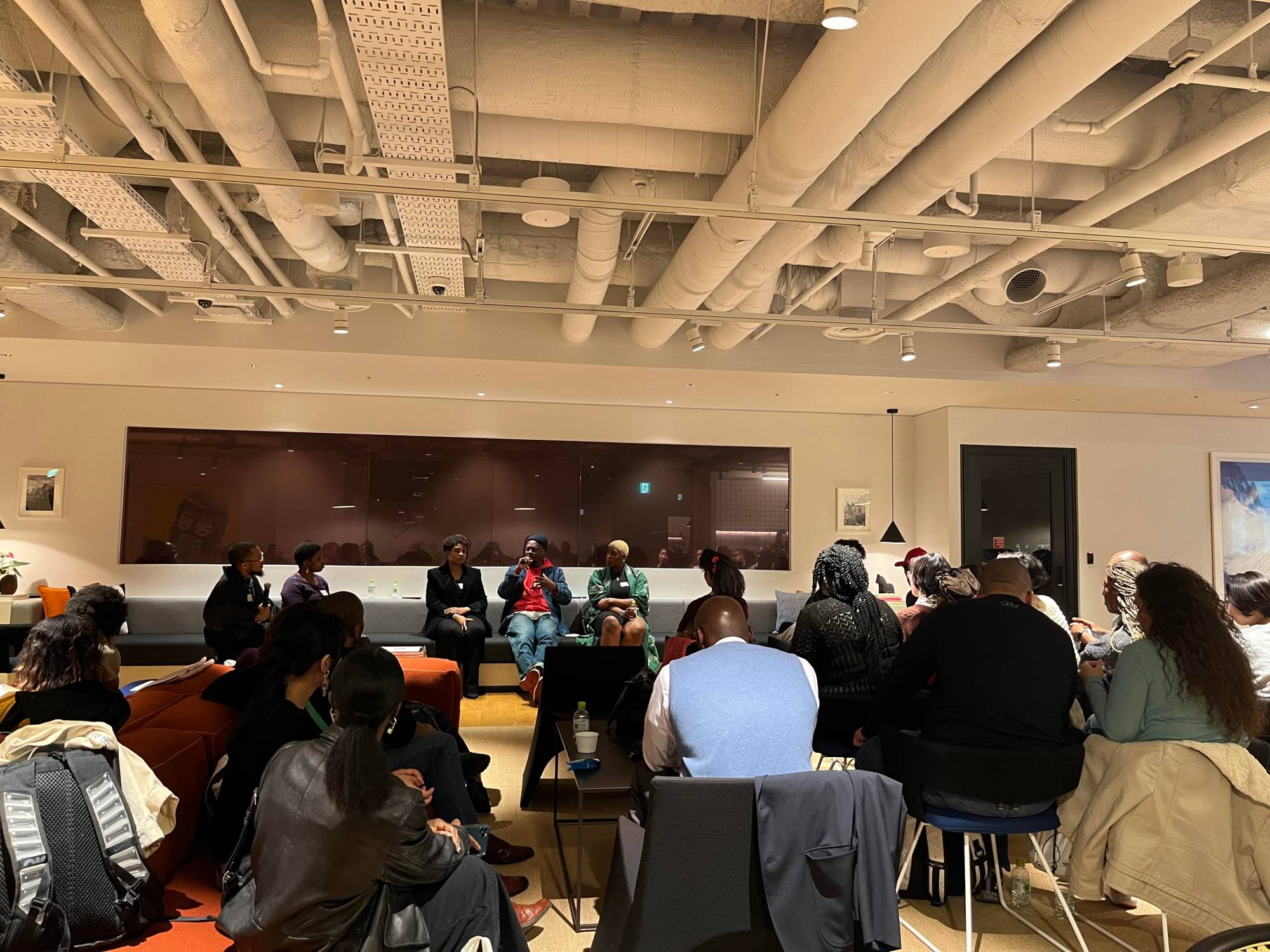 A snapshot taken from the back of the room during a panel discussion on mental health. | COURTESY OF MAURICE RABB