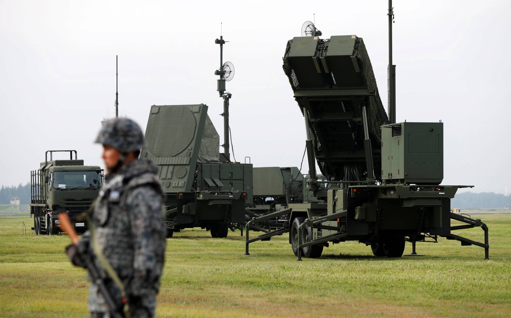 A Self-Defense Forces soldier takes part in a drill to mobilize the Patriot Advanced Capability-3 (PAC-3) missile unit in response to a missile launch by North Korea, at the U.S. Air Force's Yokota Air Base in Fussa, Tokyo, in August 2017. | REUTERS