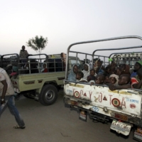 Women and children who were rescued from Islamist militant group Boko Haram arrive at a camp in Yola, Nigeria, in 2015. | REUTERS