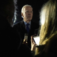 U.S. President Joe Biden speaks to the press before boarding Air Force One, as he departs Northern Ireland, at Ireland West Airport Knock on April 14. | AFP-JIJI