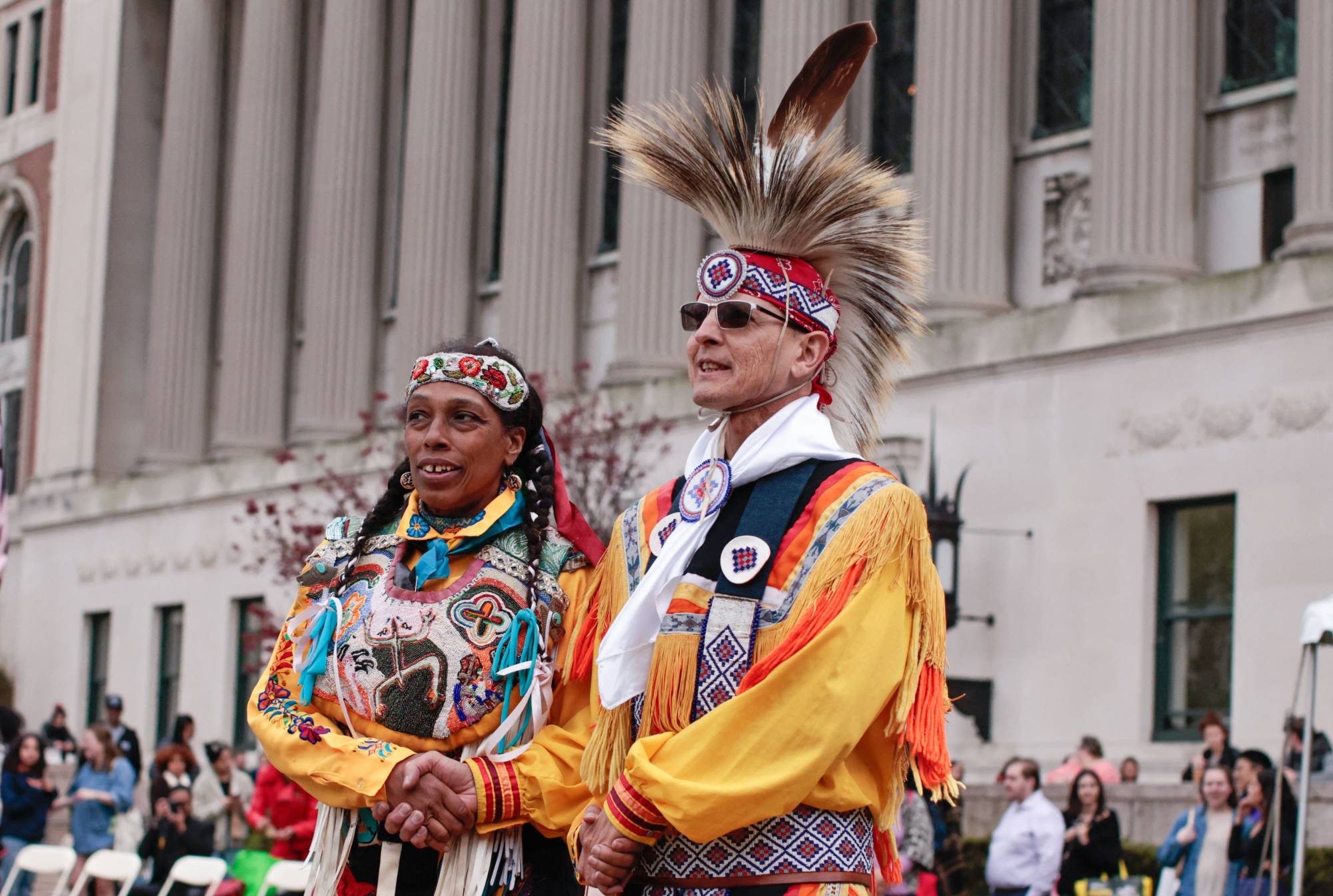 Indigenous people dance during an Earth Day event on Saturday in New York. | AFP-JIJI