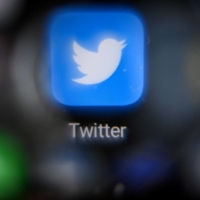 Twitter users already having to navigate a flurry of fake accounts after the removal of legacy blue ticks are noticing more inconsistencies: personalities who have been dead for years supposedly holding paid verification accounts. | AFP-JIJI