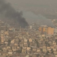 A drone view shows smoke rising over the Khartoum North Light Industrial Area, in Bahri, Sudan, on Sunday. | VIDEO OBTAINED BY REUTERS / VIA REUTERS
