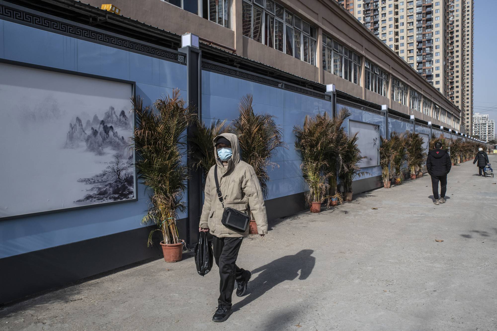 The shuttered Huanan market in Wuhan, China, Jan. 11, 2021. Under government pressure, Chinese scientists have retracted studies and withheld or deleted data about COVID-19 — the censorship has stymied efforts to understand the virus.  | GILLES SABRIé / THE NEW YORK TIMES