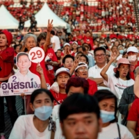 Supporters attend an election rally for Thailand\'s main opposition Pheu Thai party at the Thunder Dome Stadium in Nonthaburi, north of the capital Bangkok | AFP-JIJI