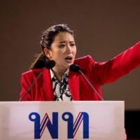 Shinawatra speaks on stage during an election rally at the Thunder Dome Stadium in Nonthaburi, north of the capital Bangkok | AFP-JIJI