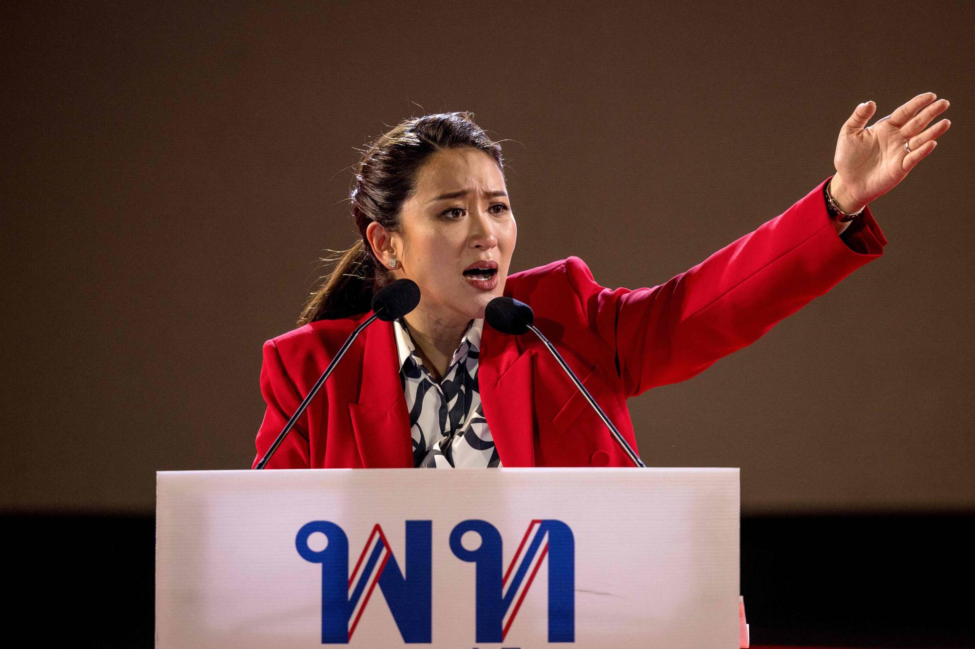 Shinawatra speaks on stage during an election rally at the Thunder Dome Stadium in Nonthaburi, north of the capital Bangkok | AFP-JIJI