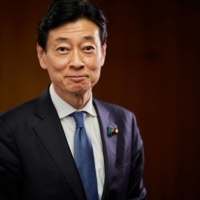 Industry minister Yasutoshi Nishimura says the government will continue promoting the next-generation chip project with Rapidus and other parties involved. | BLOOMBERG