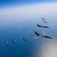 U.S. Air Force B-1B heavy bombers, F-16 fighter jets and South Korean Air Force F-35A fighters take part in a joint air drill over the Korean Peninsula last month.  | SOUTH KOREAN DEFENSE MINISTRY / VIA REUTERS   