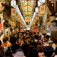 A crowd of tourists at Nishiki Market in Kyoto in March  | REUTERS 