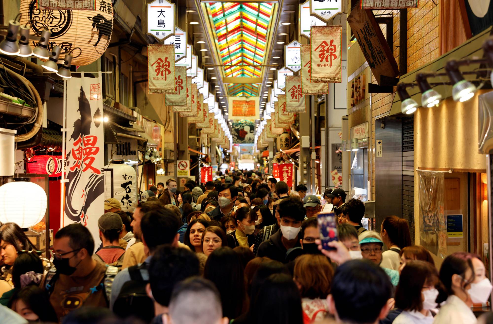 A crowd of tourists at Nishiki Market in Kyoto in March  | REUTERS 