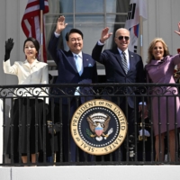 U.S. President Joe Biden and first lady Jill Biden with South Korean President Yoon Suk-yeol and his wife, Kim Keon-hee, at the White House in Washington on Wednesday | AFP-JIJI