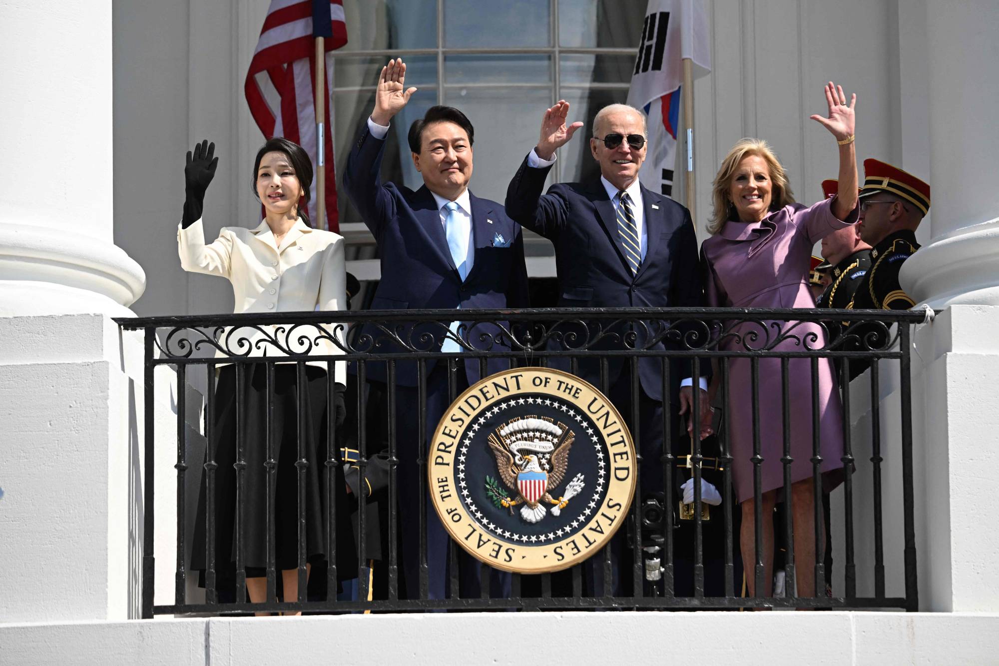 U.S. President Joe Biden and first lady Jill Biden with South Korean President Yoon Suk-yeol and his wife, Kim Keon-hee, at the White House in Washington on Wednesday | AFP-JIJI