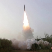 A Hwasong-18 solid-fuel intercontinental ballistic missile is test-fired from an undisclosed location in this photo taken from video released on April 14. | KCNA / VIA REUTERS