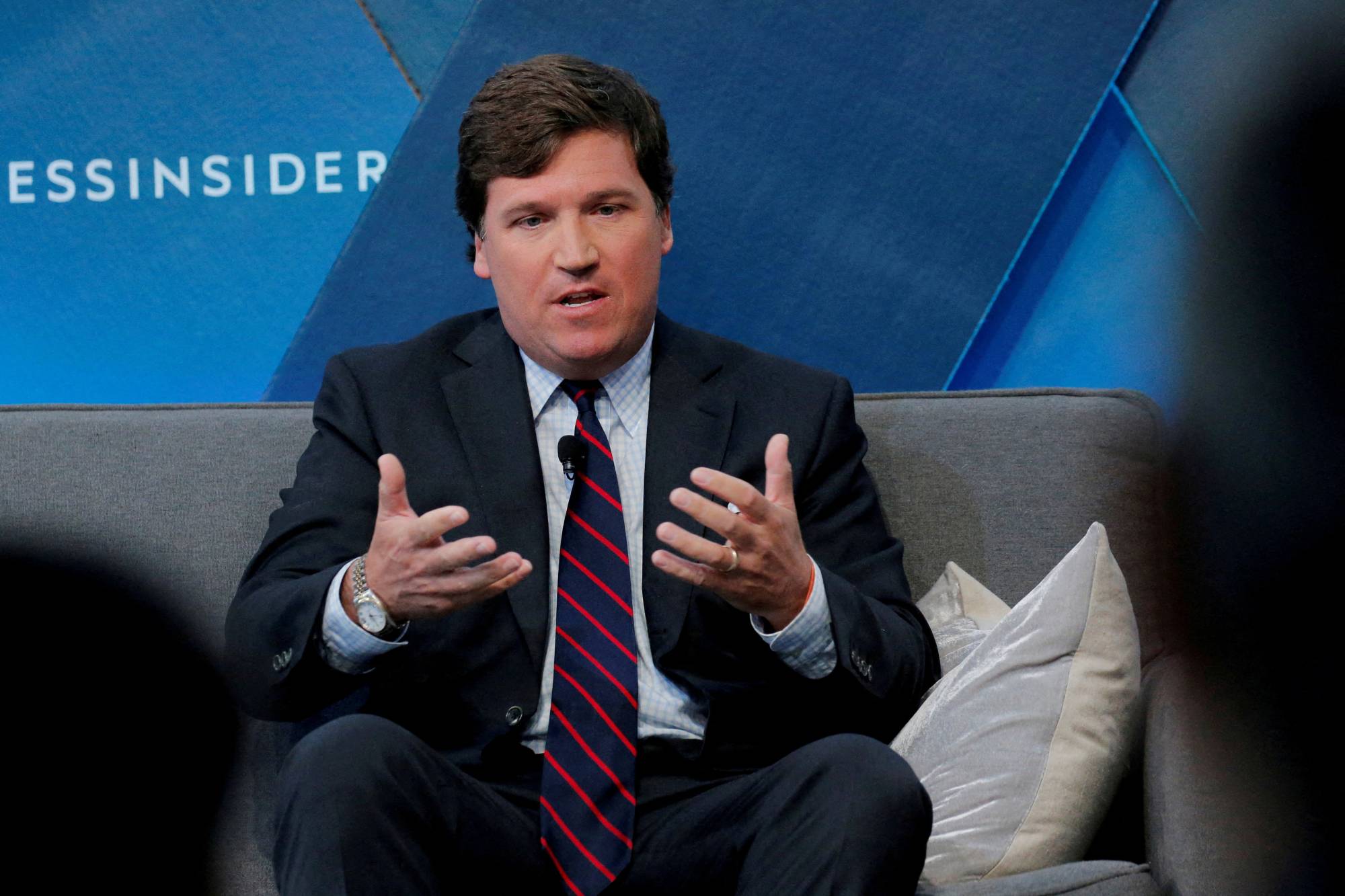 Less than a day after he was let go by Fox News, Tucker Carlson had job offers from two different Russian propaganda outlets. | REUTERS