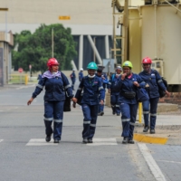Employees leave after finishing a shift at Eskom’s Lethabo coal-fired power station near Vereeniging | BLOOMBERG