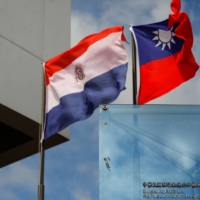 The national flags of Paraguay and Taiwan outside the building housing Taiwan\'s Embassy in Asuncion, Paraguay, on April 19 | REUTERS