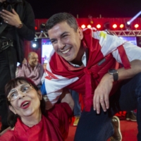 Paraguayan presidential candidate Santi Pena greets a supporter during his closing campaign rally in Asuncion, Paraguay, on Thursday. | BLOOMBERG