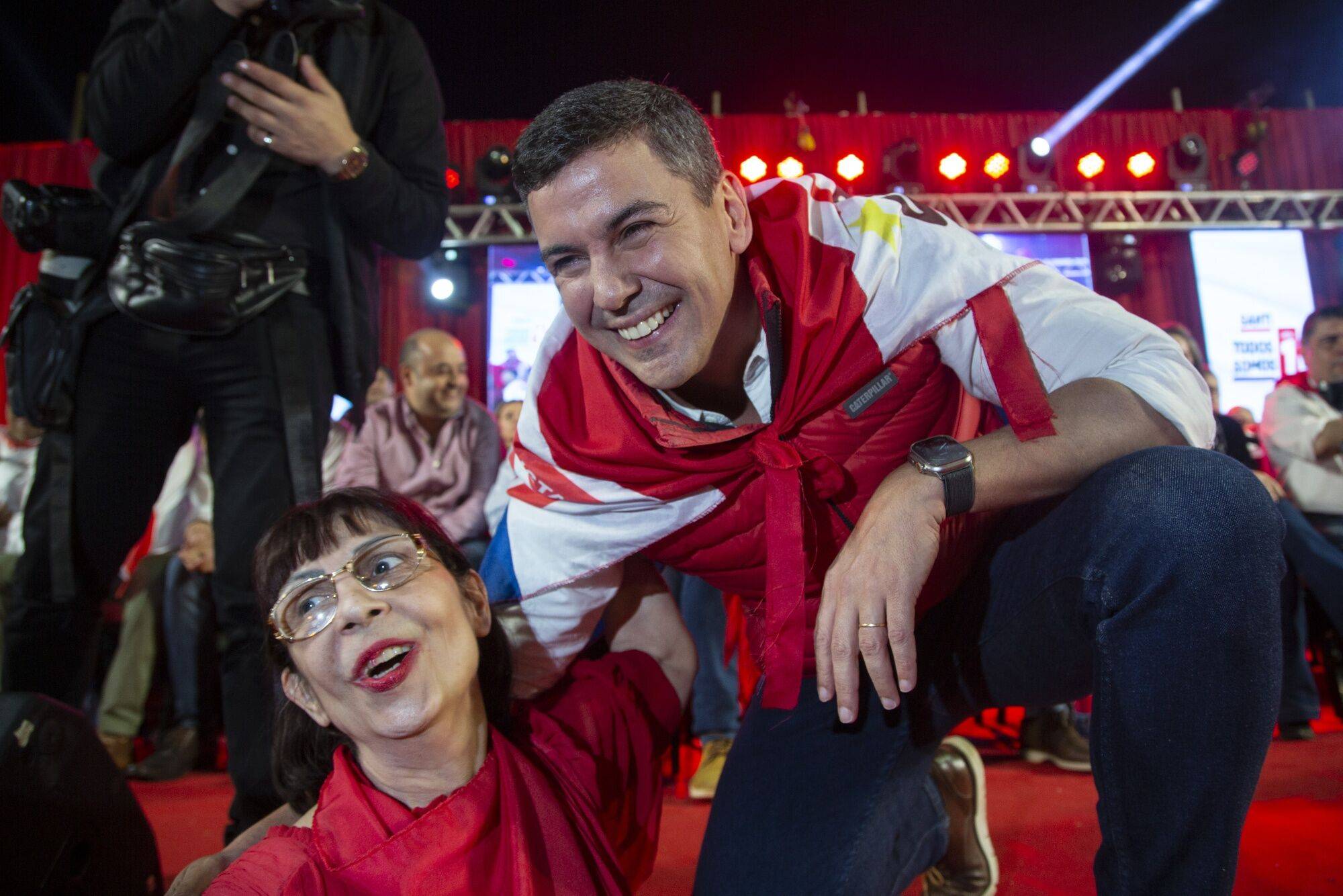 Paraguayan presidential candidate Santi Pena greets a supporter during his closing campaign rally in Asuncion, Paraguay, on Thursday. | BLOOMBERG