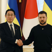 Kishida poses with Ukraine President Volodymyr Zelenskyy at their summit meeting in Kyiv on March 21. | CABINET PUBLIC AFFAIRS OFFICE