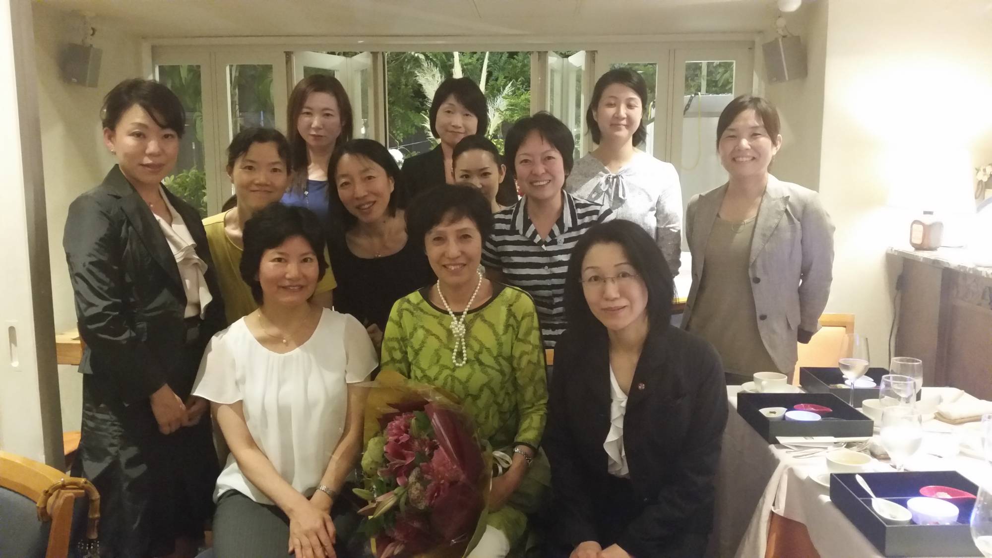A send-off party for Gotoh (front center) with women who worked at the former Ministry of Transport | COURTESY OF YASUKO GOTOH
