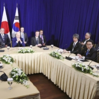 Prime Minister Fumio Kishida, U.S. President Joe Biden and South Korean leader Yoon Suk-yeol hold talks in Phnom Penh in November. | POOL / VIA KYODO