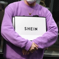 A customer outside the Shein Tokyo showroom in Tokyo in November 2022. | BLOOMBERG