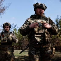 Ukrainian servicemen near Kreminna, Luhansk, Ukraine on March 26 | REUTERS