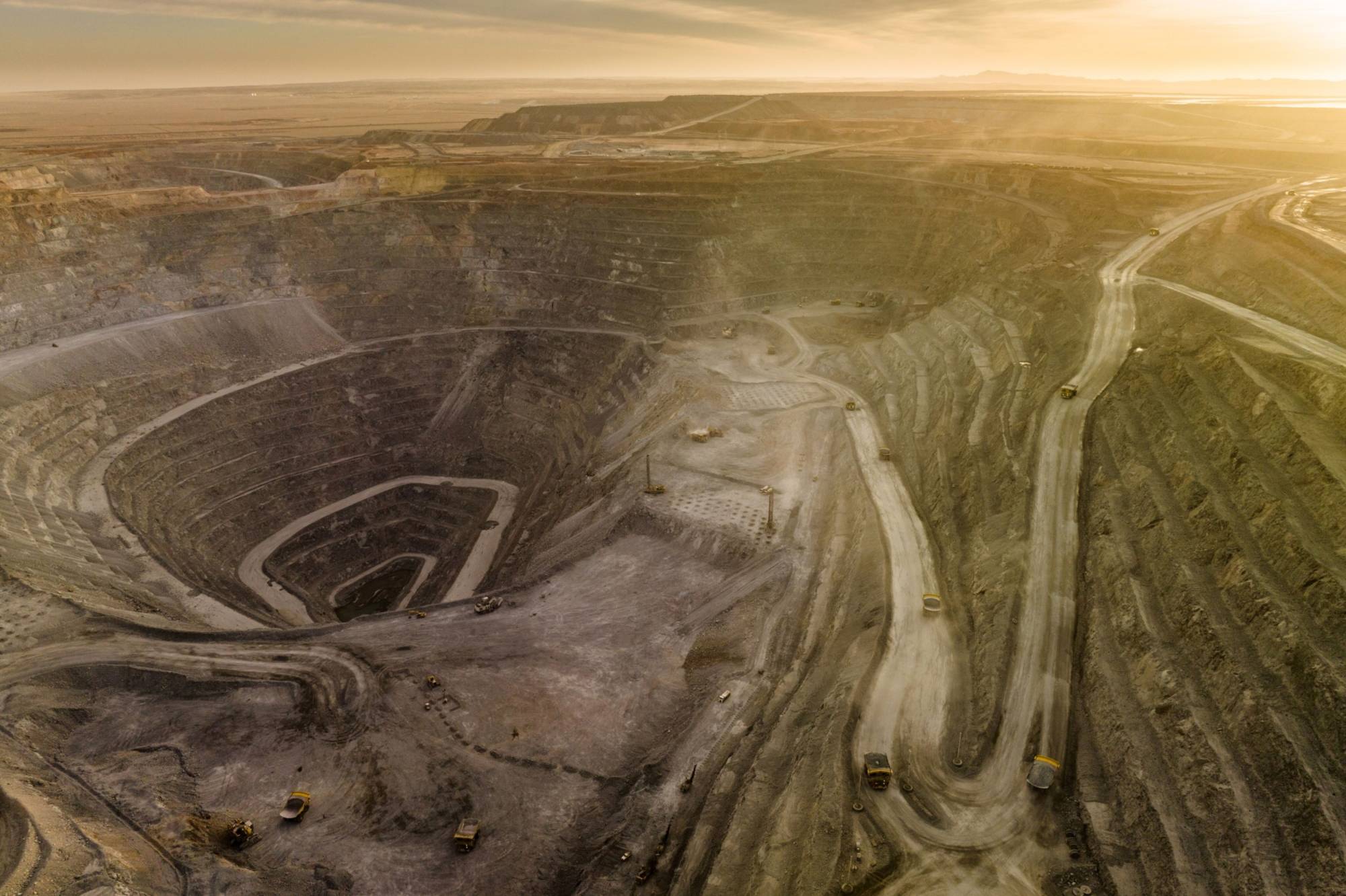 The open pit mine at the Oyu Tolgoi copper-gold mine, the South Gobi desert, Mongolia, in March. Rio has begun digging copper from the underground portion of its giant mine in Mongolia, an expansion that will turn the operation into one of the world’s largest. | BLOOMBERG